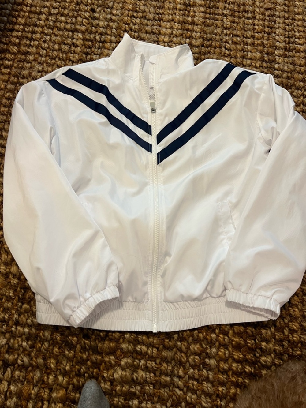 White Windbreaker Jacket with Navy Chevron Stripes